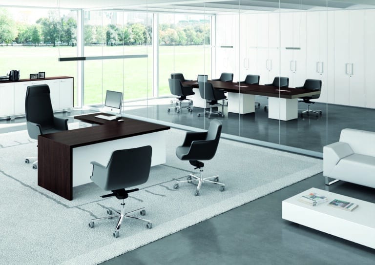 Executive office suite with executive desk and boardroom table