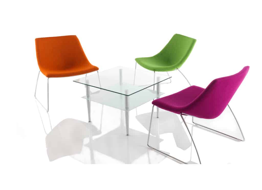 Colourful relaxing chairs for the office. Three chairs with a fabric upholstery showing in Orange, Green and Purple.